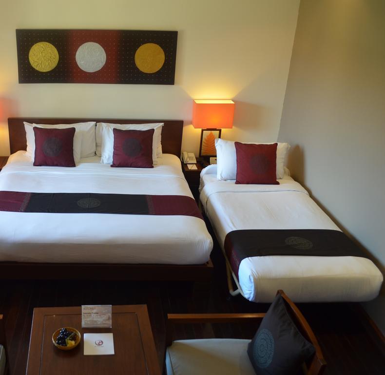 Hotel Nikko Bali Benoa Beach Νούσα Ντούα Εξωτερικό φωτογραφία A hotel room with a king bed and a single bed